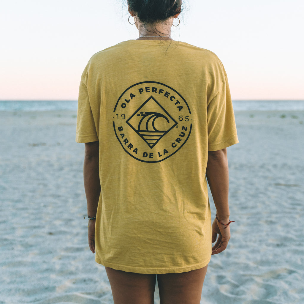 Yellow OLA PERFECTA® surf lifestyle t-shirt inspired by Barra de la Cruz.